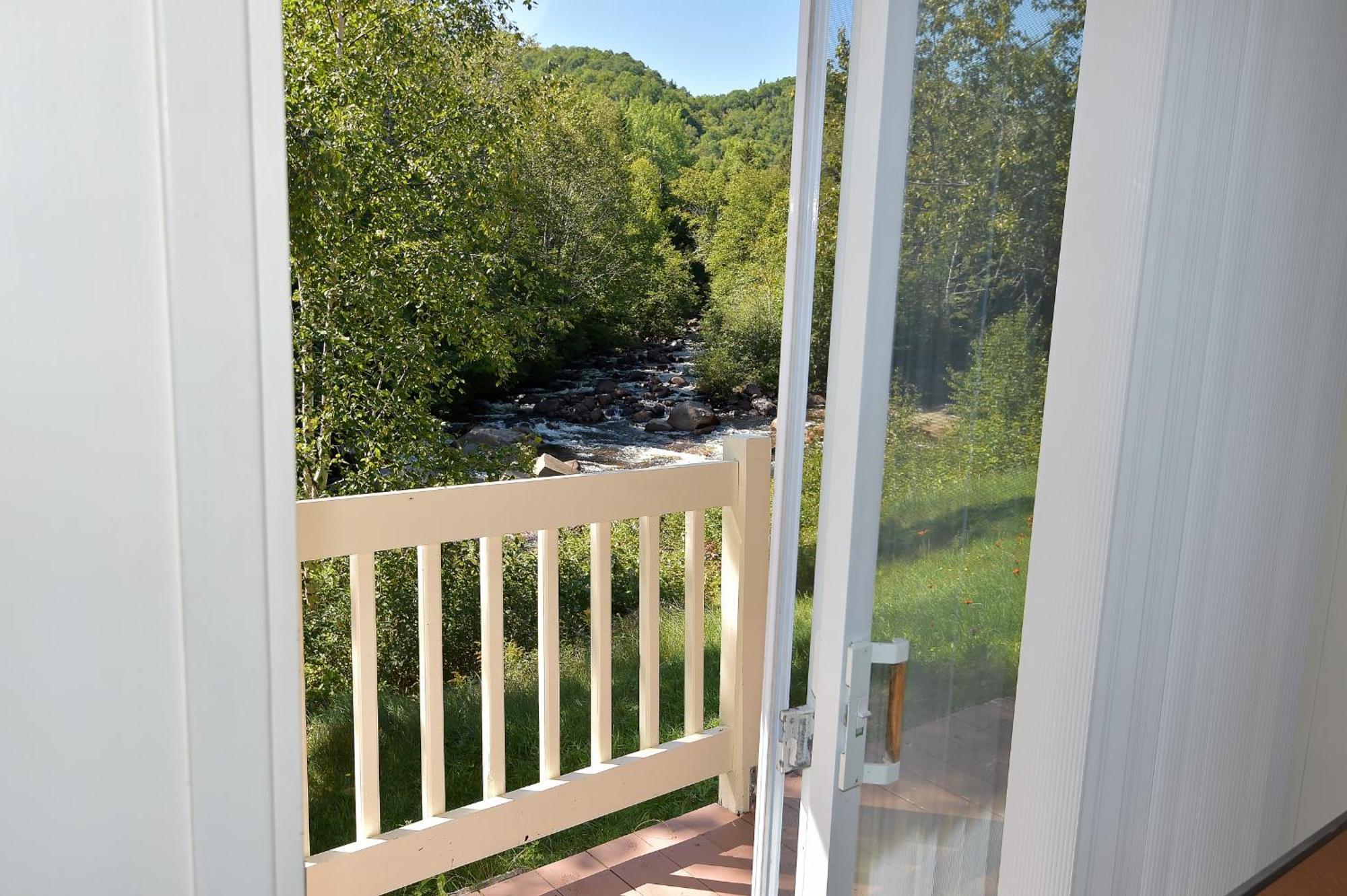 Motel Et Chalets Bo-Fleuve Evangeline Saint-Siméon Værelse billede